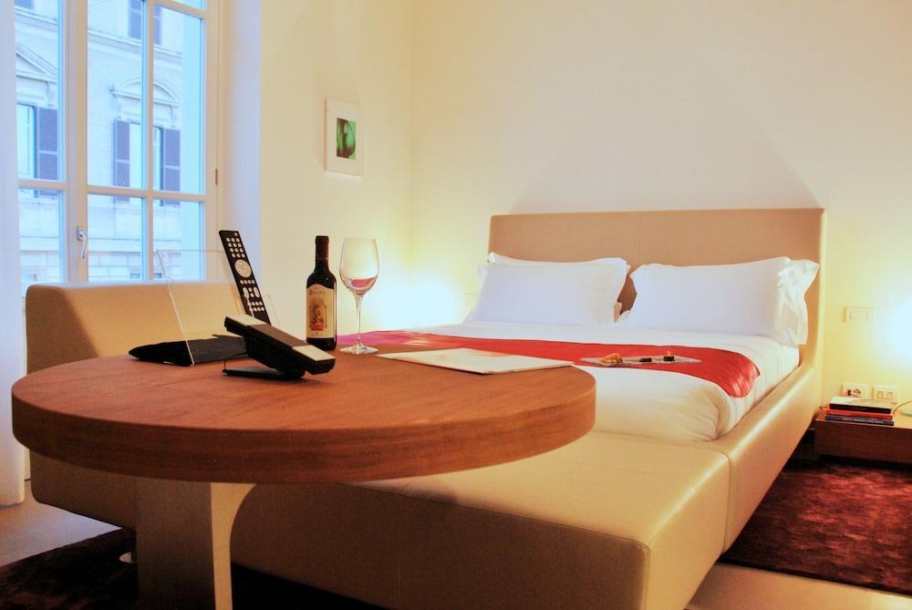 Palazzo Montemartini Rome, A Radisson Collection Hotel Ngoại thất bức ảnh A typical studio apartment