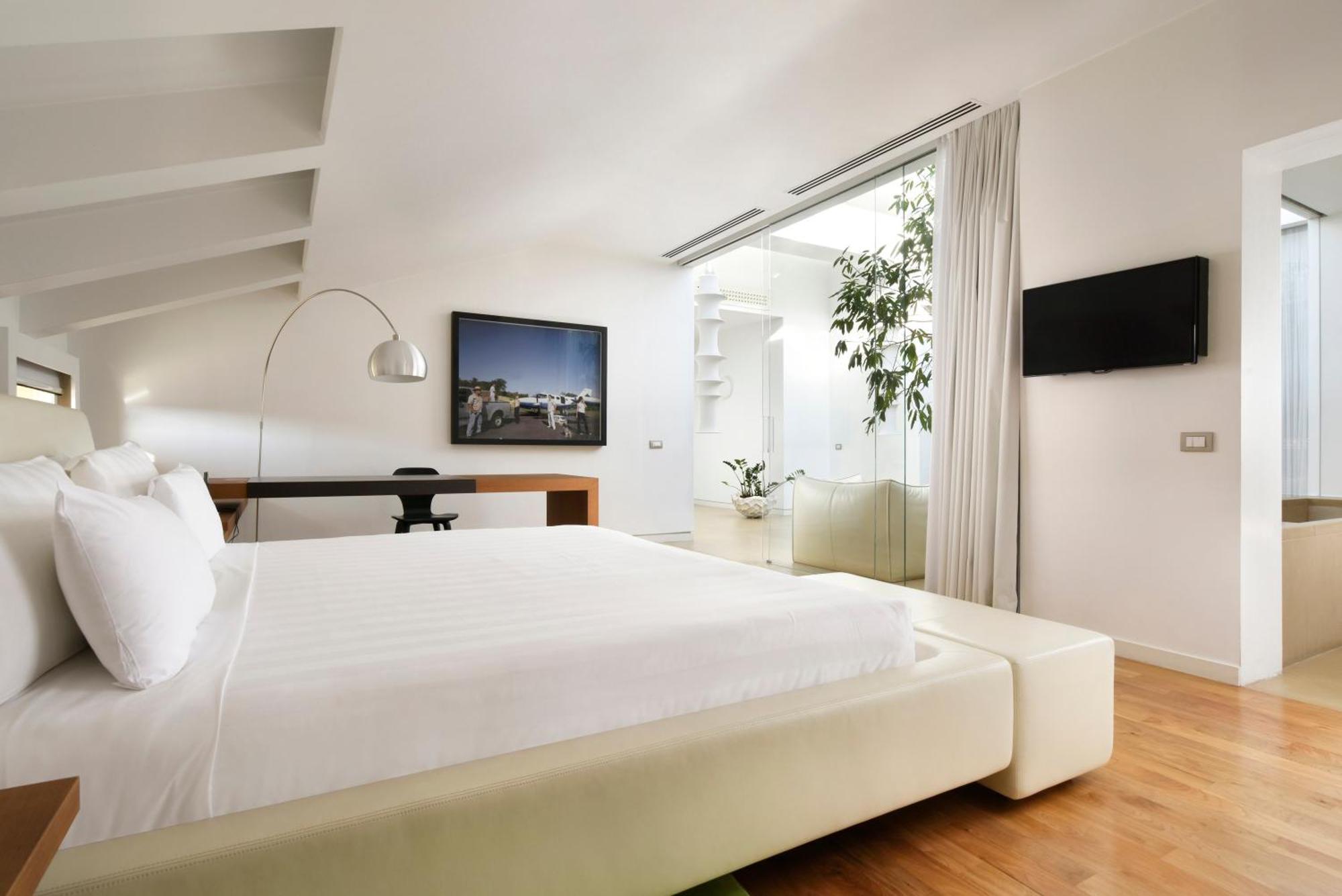 Palazzo Montemartini Rome, A Radisson Collection Hotel Ngoại thất bức ảnh A room at the hotel