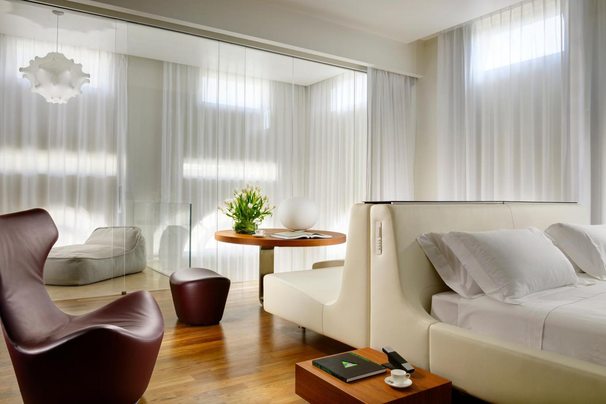 Palazzo Montemartini Rome, A Radisson Collection Hotel Ngoại thất bức ảnh A room at the Mandarin Oriental, Munich