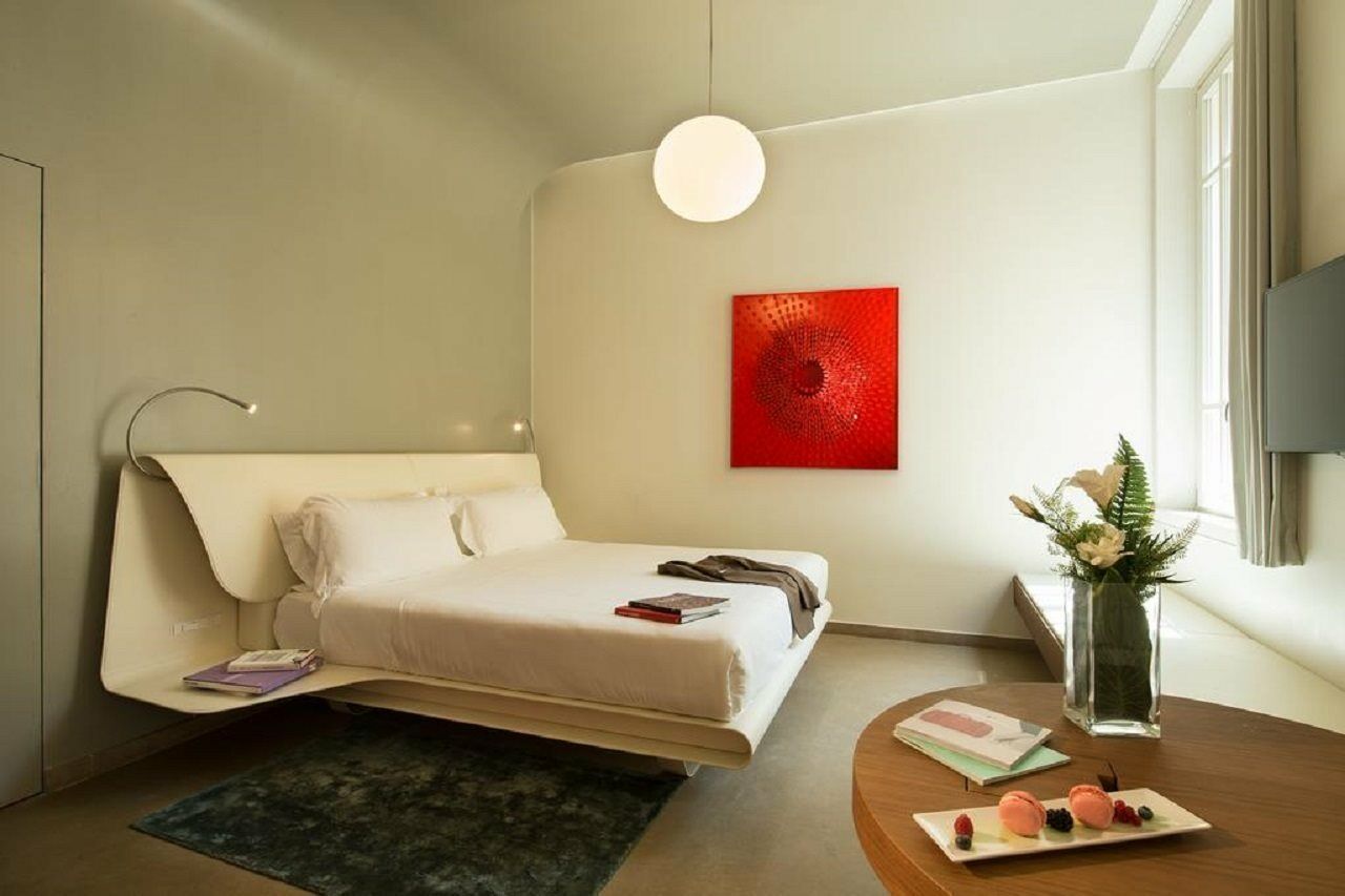 Palazzo Montemartini Rome, A Radisson Collection Hotel Ngoại thất bức ảnh A room at the hotel